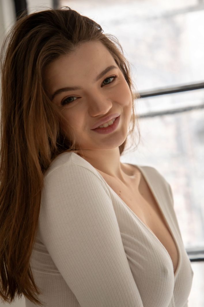 Toree in White Bodysuit. Thumb 2